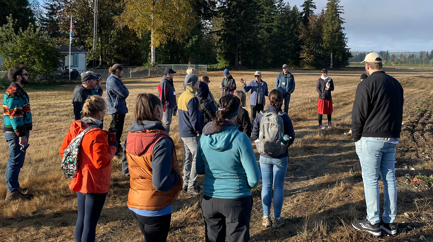 Teachers learn about sustainable farm practices from farmer at Alluvial Farms