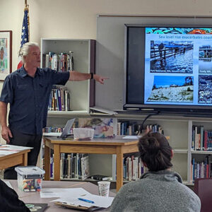 Ian Miller from Washington Sea Grant presenting on how sea level rise impacts coastal hazards