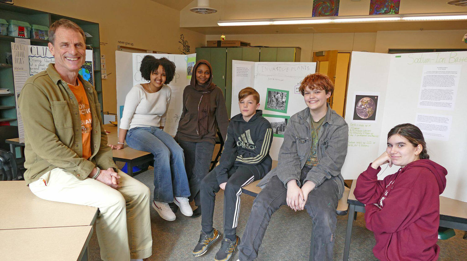 Bradley Barton with graduates of his Climate Crisis Solutions class