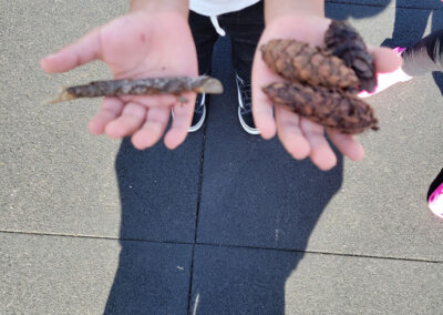 Child holding acorns