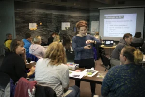 EarthGen Program Manager Becky Bronstein talks with educators.